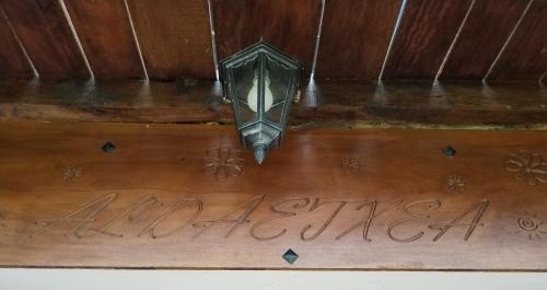 an umbrella sitting on top of a wooden table at Aldaetxea in Biáñez