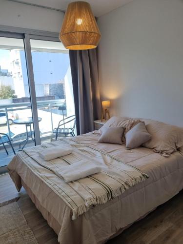 En eller flere senge i et værelse på Lo de Tino