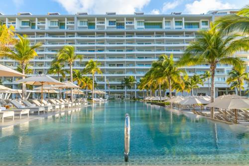 a view of the resort from the pool at Garza Blanca Resort & Spa Cancun in Cancún