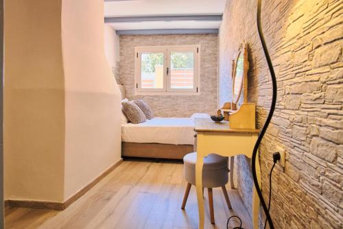 Ένα ή περισσότερα κρεβάτια σε δωμάτιο στο Paliabelo Village House
