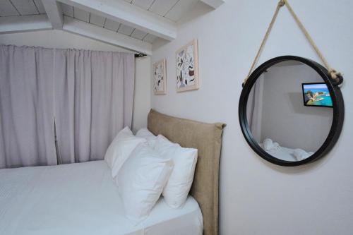 Ένα ή περισσότερα κρεβάτια σε δωμάτιο στο Paliabelo Village House