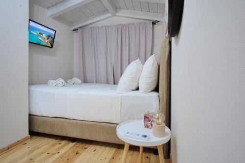 Ένα ή περισσότερα κρεβάτια σε δωμάτιο στο Paliabelo Village House