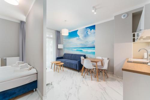 Ένα ή περισσότερα κρεβάτια σε δωμάτιο στο Apartament Baltic Park IIA z Basenem Letnim by HolidaySun