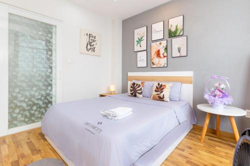 เตียงในห้องที่ Sweet Rentals Homes