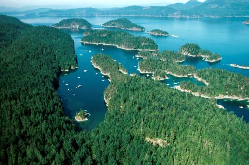 an aerial view of a group of islands in a lake at Shannaghs Sweet Escape in Powell River