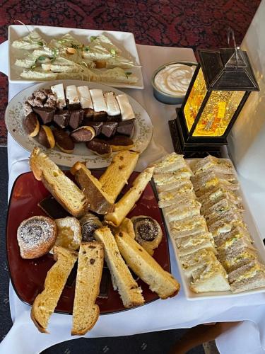 a table with two plates of food on a table at Shannaghs Sweet Escape in Powell River