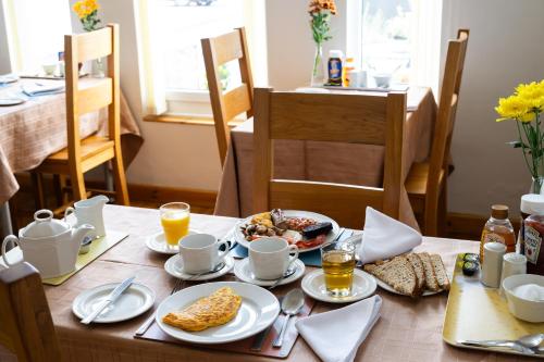 a table with breakfast food on top of it at Dene House in Great Yarmouth
