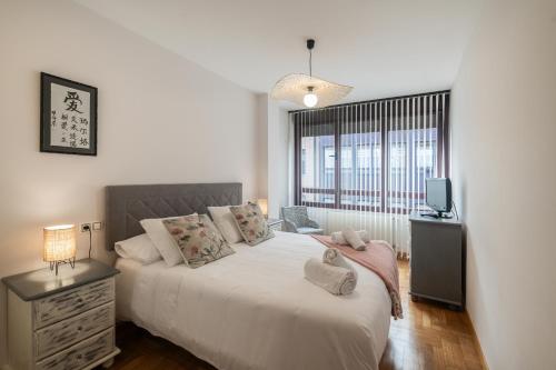 Postel nebo postele na pokoji v ubytování Espumeru, apartamento en Llanes VUT-183-AS