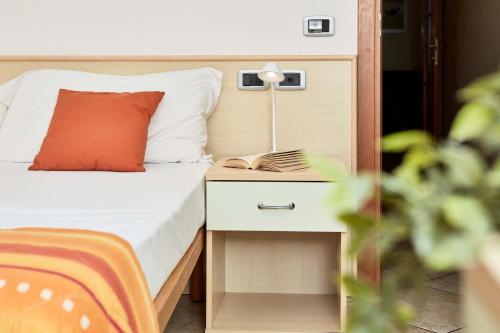 Katil atau katil-katil dalam bilik di Bella Villa Apartments