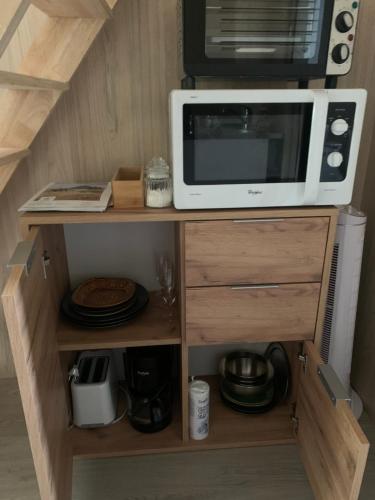 Kuchyň nebo kuchyňský kout v ubytování Tiny House à 10min du Mont Saint Michel