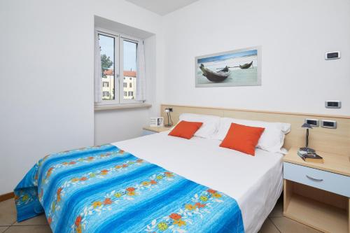 Katil atau katil-katil dalam bilik di Bella Villa Apartments