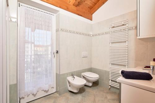 Bilik mandi di Bella Villa Apartments