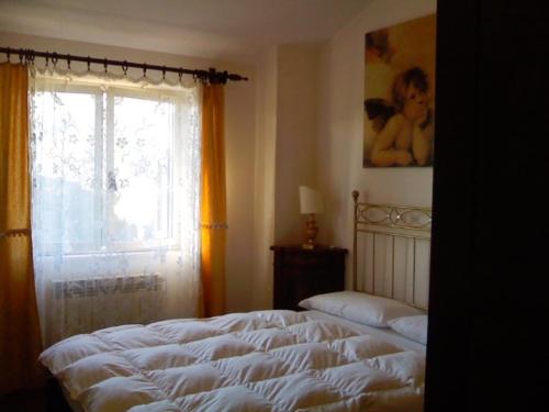 Posteľ alebo postele v izbe v ubytovaní Affittacamere Le Meridiane