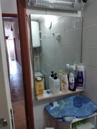 a bathroom with a sink and a mirror at Hippocampus House in Stratónion