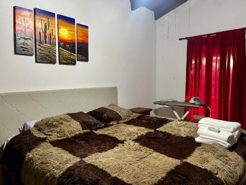 Ένα ή περισσότερα κρεβάτια σε δωμάτιο στο Casa en los Nogales Yala