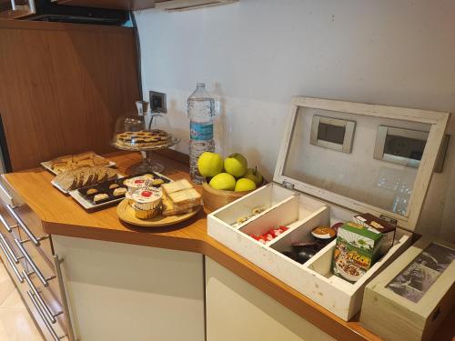 a kitchen counter with some food on it at Charme&Chic in Trieste