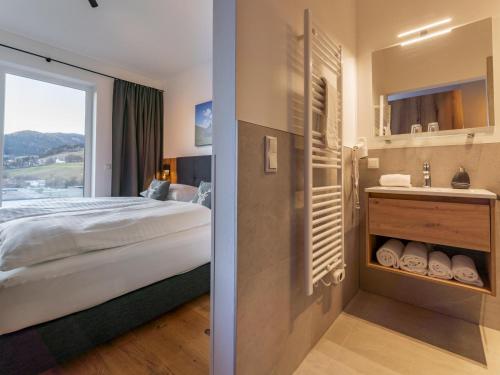 Postel nebo postele na pokoji v ubytování Grebenzen Lodge Hirsch