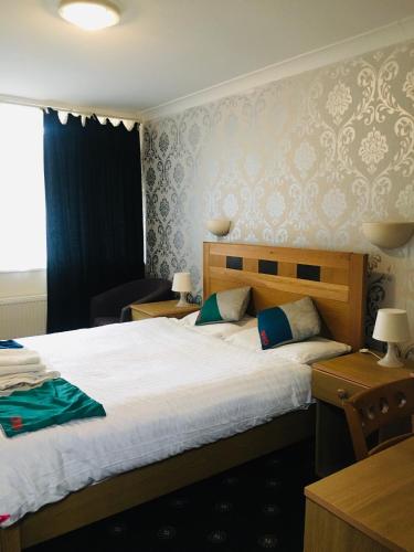 Ένα ή περισσότερα κρεβάτια σε δωμάτιο στο Hotel Knowesgate