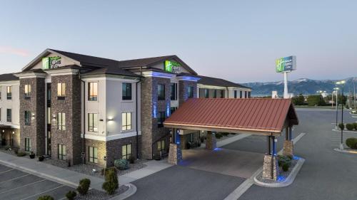 a rendering of a hotel with a red roof at Holiday Inn Express Belgrade-Bozeman Area by IHG in Belgrade