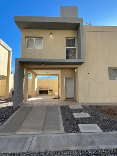 a large house with a driveway in front of it at Cabañas Balcón del Famatina in Chilecito