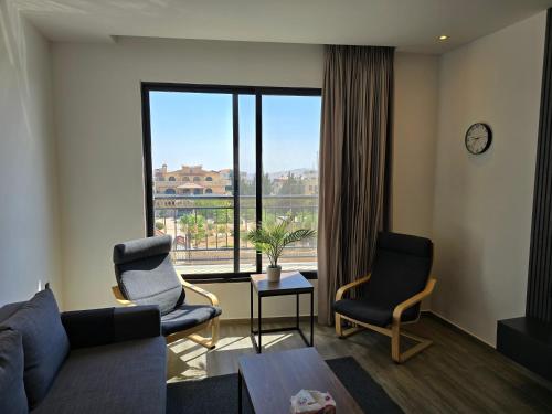 Un lugar para sentarse en Alshakreen suites