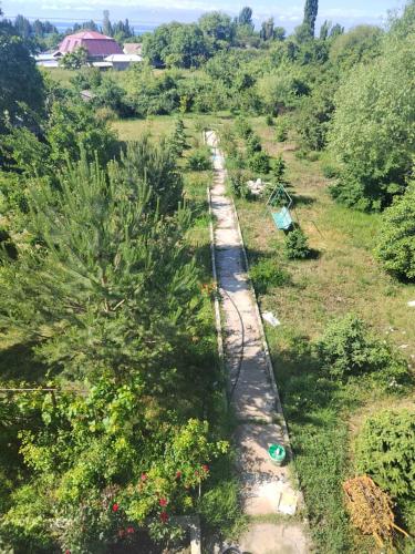 an overhead view of a garden with a road at У Дяди Жени in Temirovka