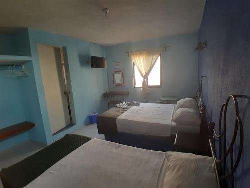 Katil atau katil-katil dalam bilik di Casona Doña María Elena