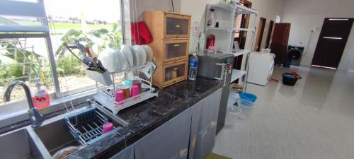 Η κουζίνα ή μικρή κουζίνα στο Homestay Schemumarc