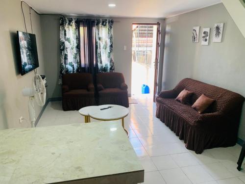 Et opholdsområde på Calapan Transient House Xevera