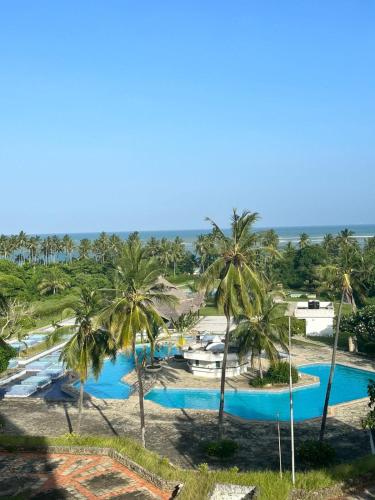 an aerial view of a resort with palm trees at Sea la Blue in Ukunda