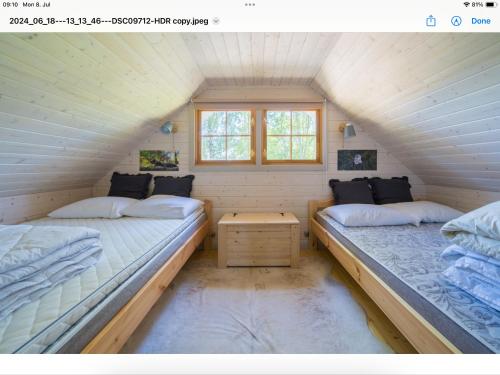 Postel nebo postele na pokoji v ubytování Võlsi puhkemaja