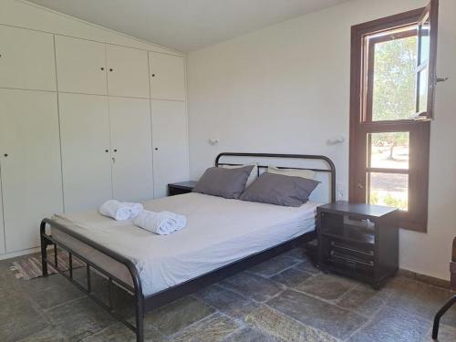 Ένα ή περισσότερα κρεβάτια σε δωμάτιο στο Seaside Villa