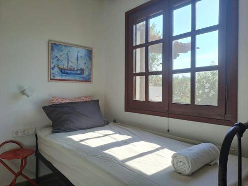 Ένα ή περισσότερα κρεβάτια σε δωμάτιο στο Seaside Villa