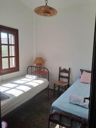 Ένα ή περισσότερα κρεβάτια σε δωμάτιο στο Seaside Villa