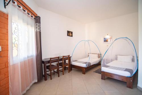 Ένα ή περισσότερα κρεβάτια σε δωμάτιο στο HOTEL H1 ISALO