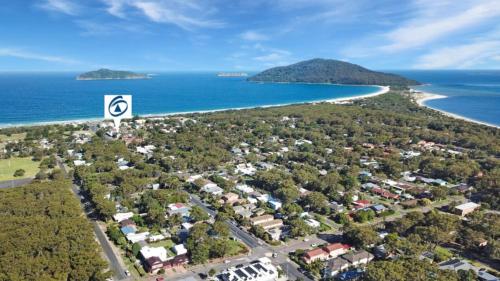 an aerial view of a town and the beach at Lazy Dayz On Booner! in Hawks Nest