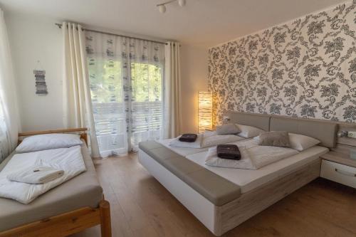 Cama o camas de una habitación en ALPINpelso
