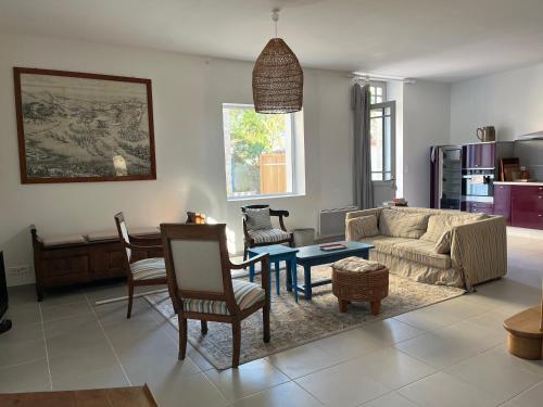 Χώρος καθιστικού στο Maison vue sur mer paisible