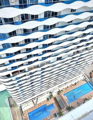 an aerial view of a large building with a pool at The Wave - 3R3BR Duplex Penthouse l 10 Pax l Near Jonker l A23A15 in Melaka