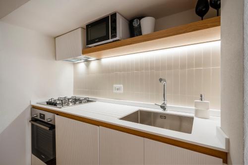 Kuchyň nebo kuchyňský kout v ubytování Infinito Luxury Suite
