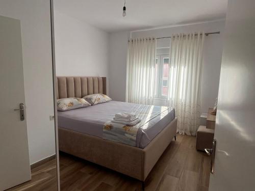 Postel nebo postele na pokoji v ubytování Guest House Durres