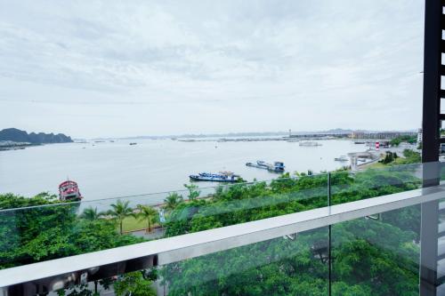 a view of the river from the balcony of a building at Bạch Đằng Hạ Long Hotel in Ha Long