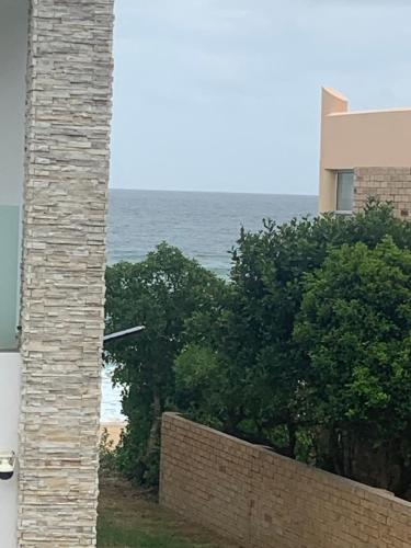 a view of the ocean from a building at Kolstert Bliss at Glentana in Groot Brak Rivier