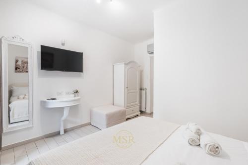 Una cama o camas en una habitación de MysuiteRome