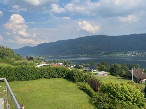 a view of a body of water from a house at Ferienhaus Ossiacher See in Stiegl