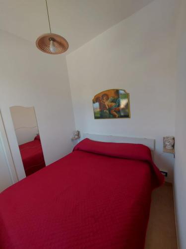 Postel nebo postele na pokoji v ubytování Casa Vacanze Dorotea
