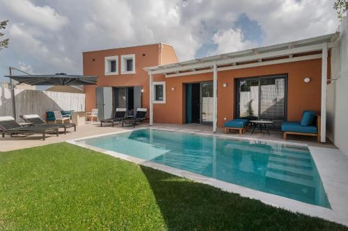 Bazén v ubytování Tessera Villas & Studios Collection nebo v jeho okolí