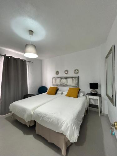 Postel nebo postele na pokoji v ubytování Hostal Berlin