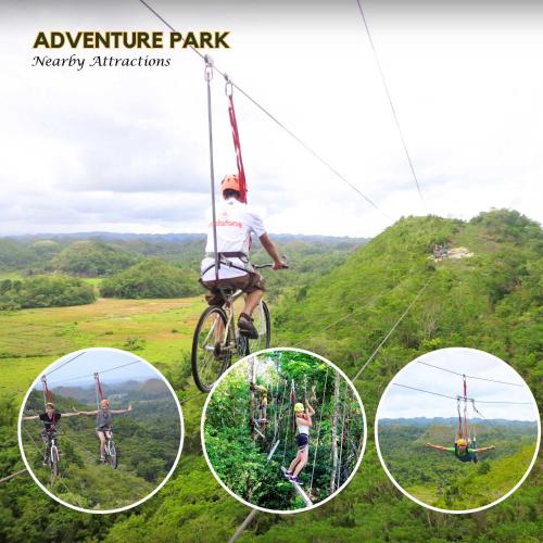 a man riding a bike on an adventure park at Eco Glamping Treehouses Closest Resort To All Tourist Attractions in Balilihan