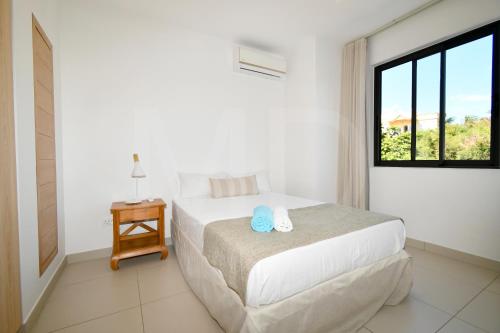 Una cama o camas en una habitación de Barachois 5